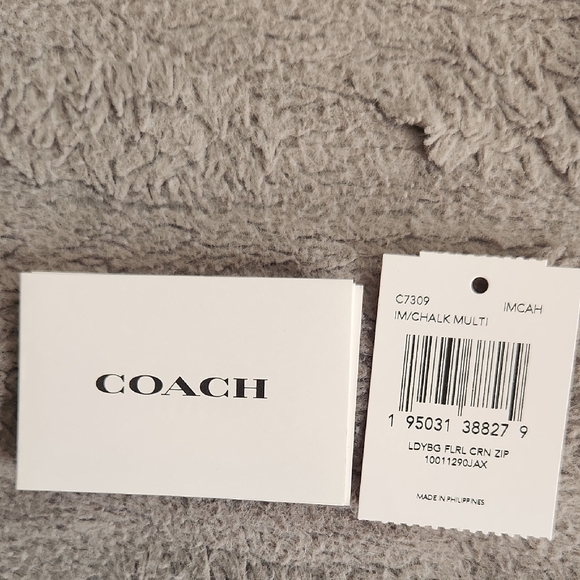 Coach Cream Wristlet with Floral and Ladybug Design - Picture 7 of 9